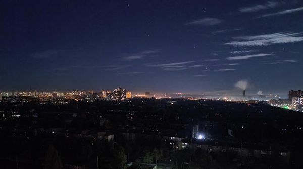 A photograph shows a view of Kiev late on October 11, 2022 during a rolling blackout of parts of districts of the Ukrainian capital following rocket attacks  - Sputnik International