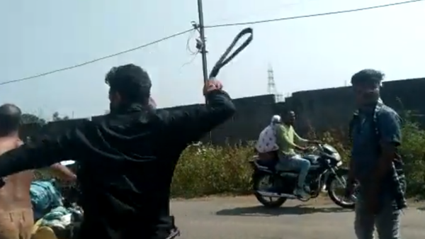 Screenshot from a video showing Indian police officers punishing men who were allegedly selling beef in Chhattisgarh - Sputnik International