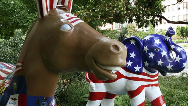 The symbols of the Democratic(L) (donkey) and Republican (elephant) parties are seen on display in Washington, DC on August 25, 2008. - Sputnik International