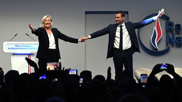 Newly elected French party Rassemblement National (RN)'s president Jordan Bardella, next to French party Rassemblement National (RN) parliamentary group leader Marine Le Pen, thanks the audience during the Rassemblement National's 18th congress in Paris on November 5, 2022. (Photo by Alain JOCARD / AFP) - Sputnik International