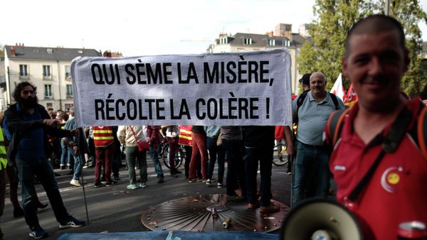 Protesters hold a banner that reads who sows misery reaps anger during a demonstration in Nantes, western France - Sputnik International