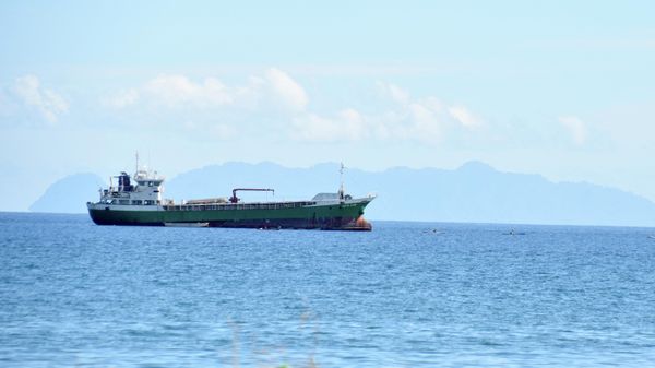 This picture taken on August 30, 2022, shows a ship is seen anchored near the Honiara port of Solomons Island - Sputnik International