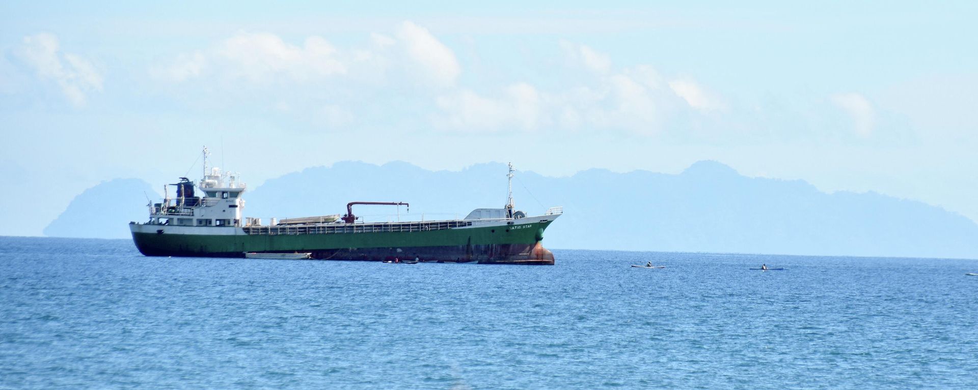 This picture taken on August 30, 2022, shows a ship is seen anchored near the Honiara port of Solomons Island - Sputnik International, 1920, 08.11.2022