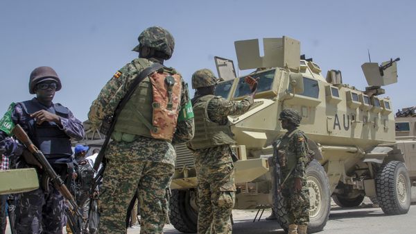 African Union peacekeepers from Uganda provide security as Somali lawmakers arrive to cast their vote in the presidential election, at the Halane military camp in Mogadishu, Somalia Sunday, May 15, 2022. - Sputnik International