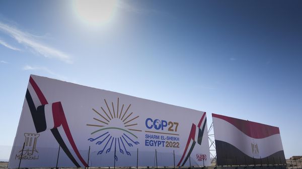 The COP27 U.N. Climate Summit logo and the Egyptian flag are displayed on a billboard lining a newly constructed highway in Sharm el-Sheikh, Egypt, Saturday, Nov. 5, 2022. The city will host the COP27 U.N. Climate Summit starting on Nov. 6, and scheduled to end on Nov. 18. - Sputnik International