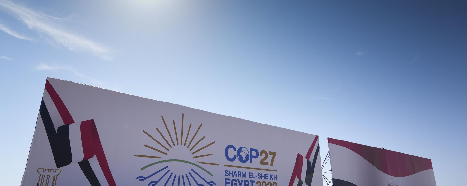 The COP27 U.N. Climate Summit logo and the Egyptian flag are displayed on a billboard lining a newly constructed highway in Sharm el-Sheikh, Egypt, Saturday, Nov. 5, 2022. The city will host the COP27 U.N. Climate Summit starting on Nov. 6, and scheduled to end on Nov. 18. The COP27 U.N. Climate Summit logo and the Egyptian flag are displayed on a billboard lining a newly constructed highway in Sharm el-Sheikh, Egypt, Saturday, Nov. 5, 2022. The city will host the COP27 U.N. Climate Summit starting on Nov. 6, and scheduled to end on Nov. 18. - Sputnik International, 1920, 20.11.2022
