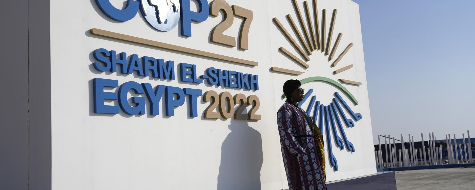 A woman poses for a photo in front of a sign at the COP27 U.N. Climate Summit, Wednesday, Nov. 16, 2022, in Sharm el-Sheikh, Egypt. A woman poses for a photo in front of a sign at the COP27 U.N. Climate Summit, Wednesday, Nov. 16, 2022, in Sharm el-Sheikh, Egypt. - Sputnik International, 1920, 20.11.2022