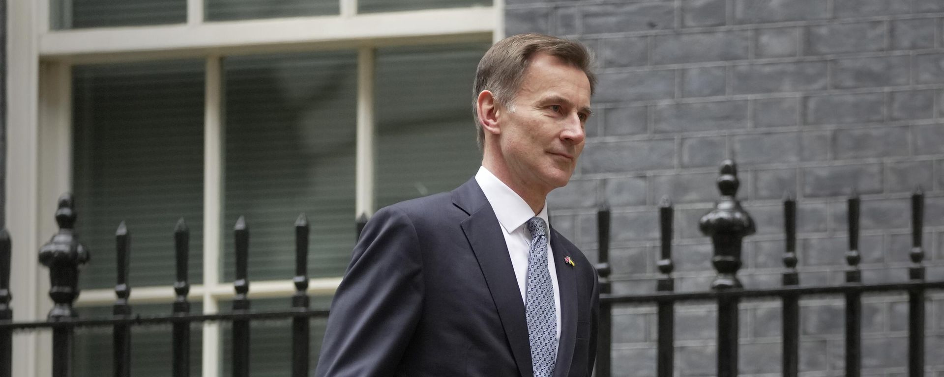 Britain's Chancellor Jeremy Hunt leaves 11 Downing Street to deliver his autumn financial statement to Parliament Britain's Chancellor Jeremy Hunt leaves 11 Downing Street to deliver his autumn financial statement to Parliament - Sputnik International, 1920, 18.01.2023