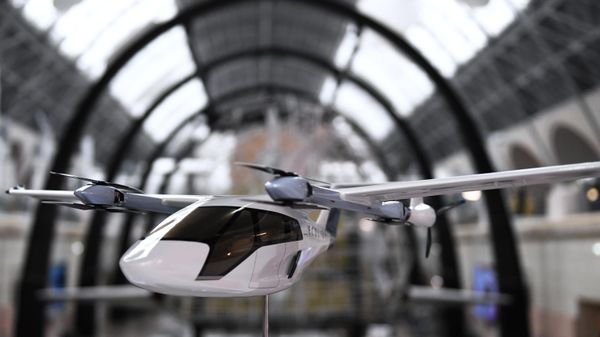 A model of vertical take-off and landing (VTOL) aircraft developed by Russian aviation engineering bureau Ecolibri - Sputnik International