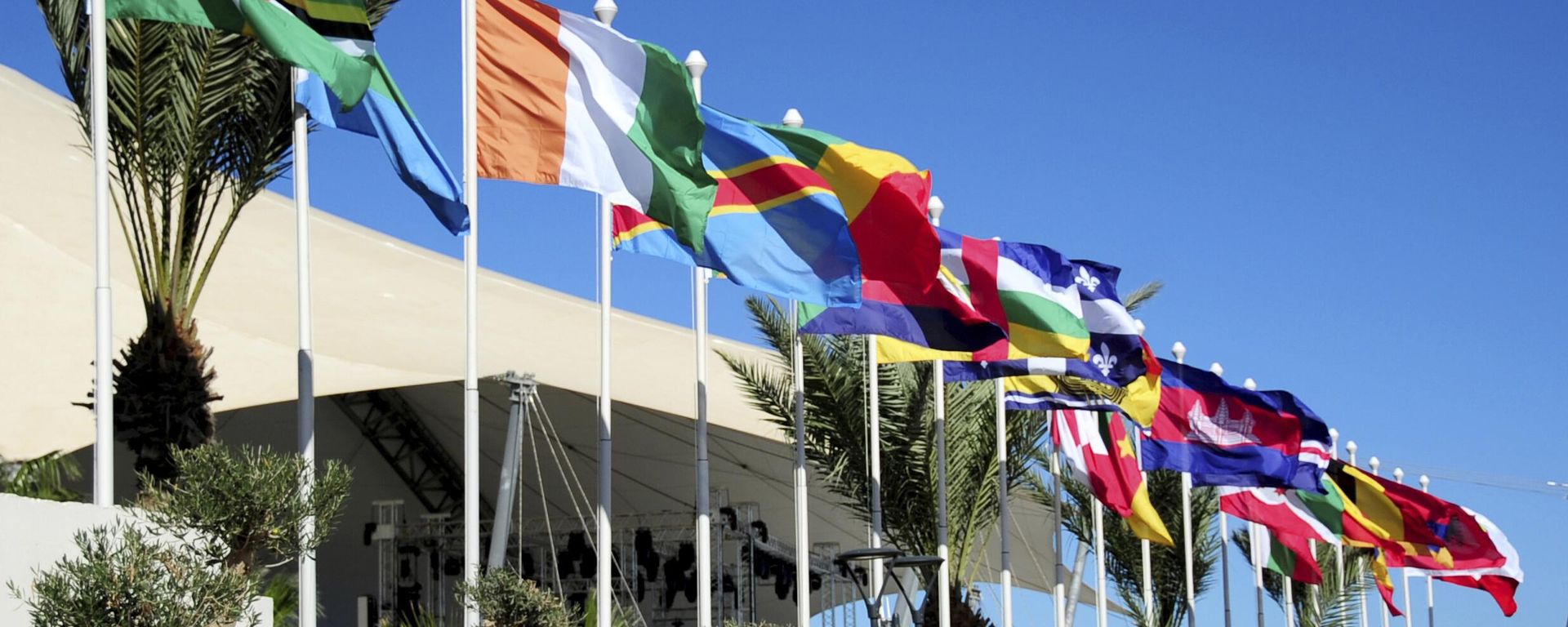 Flags of different countries wave in the wind on the eve of the 18th Francophone Summit in Djerba, Tunisia, Friday, Nov. 18, 2022. Flags of different countries wave in the wind on the eve of the 18th Francophone Summit in Djerba, Tunisia, Friday, Nov. 18, 2022. - Sputnik International, 1920, 20.11.2022
