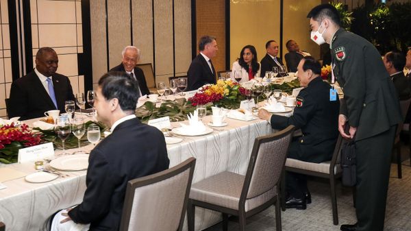 China's Defense Minister, Gen. Wei Fenghe, center right, talks with U.S. Secretary of Defense Lloyd Austin, left, during the 19th International Institute for Strategic Studies (IISS) Shangri-la Dialogue, Asia's premier defense forum, in Singapore, Saturday, June 11, 2022. - Sputnik International
