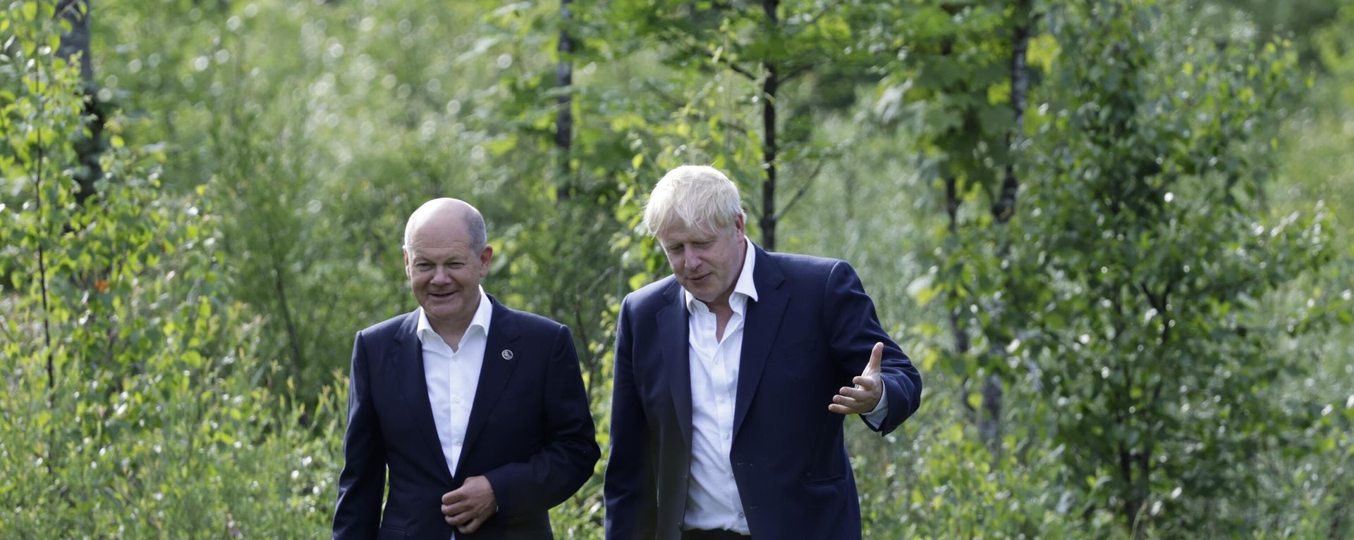 German Chancellor Olaf Scholz and British Prime Minister Boris Johnson walk during a bilateral meeting during the first day of the G7 leaders' summit at Bavaria's Schloss Elmau castle German Chancellor Olaf Scholz and British Prime Minister Boris Johnson walk during a bilateral meeting during the first day of the G7 leaders' summit at Bavaria's Schloss Elmau castle - Sputnik International, 1920, 05.02.2023