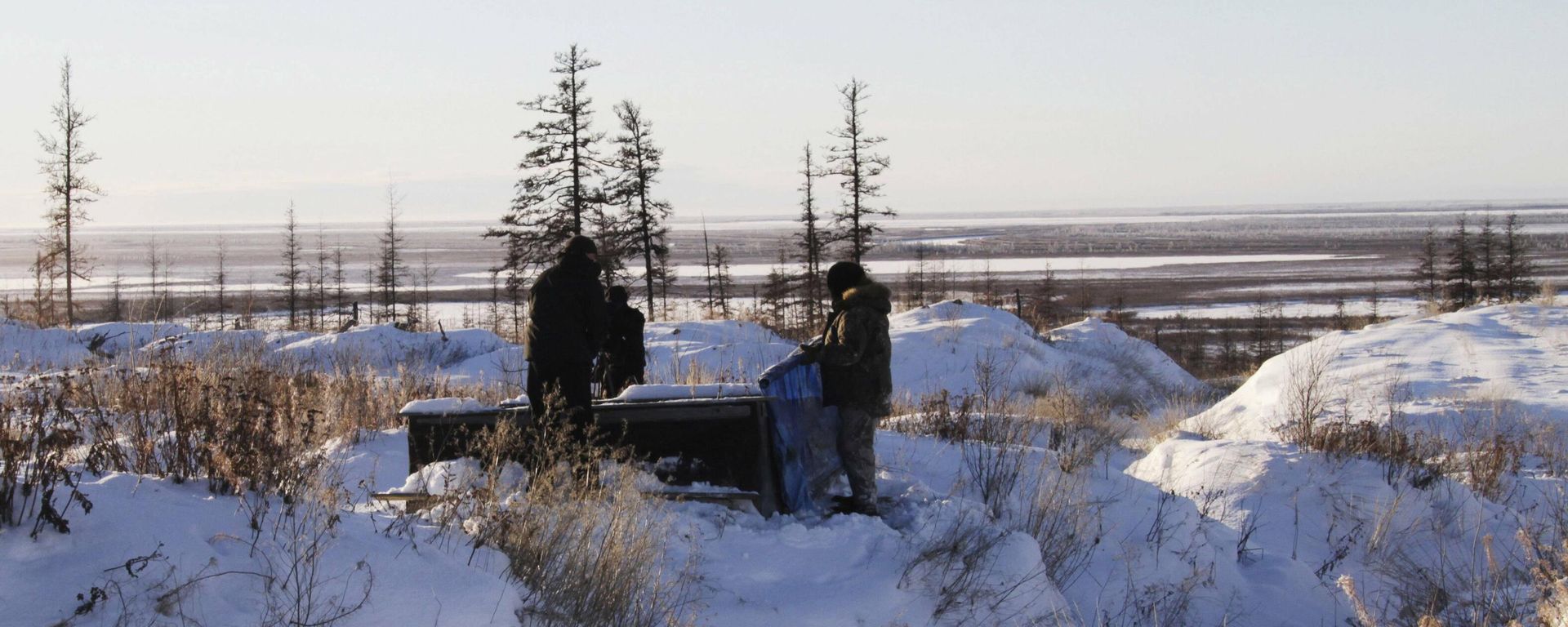 Russian scientists Sergey Zimov and his son Nikita Zimov extract air samples from frozen soil near the town of Chersky in Siberia 6,600 kms (4,000 miles) east of Moscow, Russia. Russian scientists Sergey Zimov and his son Nikita Zimov extract air samples from frozen soil near the town of Chersky in Siberia 6,600 kms (4,000 miles) east of Moscow, Russia. - Sputnik International, 1920, 25.11.2022