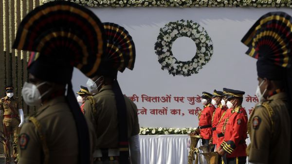 A police band pays tribute to victims of the 2008 Mumbai terror attacks on its anniversary at the police headquarters in Mumbai, India, Friday, Nov. 26, 2021.  - Sputnik International