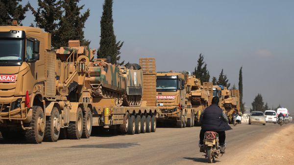 (FILE) In this file photo taken on March 03, 2020 a convoy of Turkish military vehicles is pictured near the town of Hazano in the rebel-held northern countryside of Syria's Idlib province. - Sputnik International