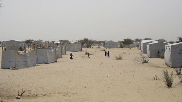 Nigerians who fled Boko Haram  to Chad walk through the Baga Sola refugee camp near the shore of Lake Chad Wednesday March 4, 2015. - Sputnik International