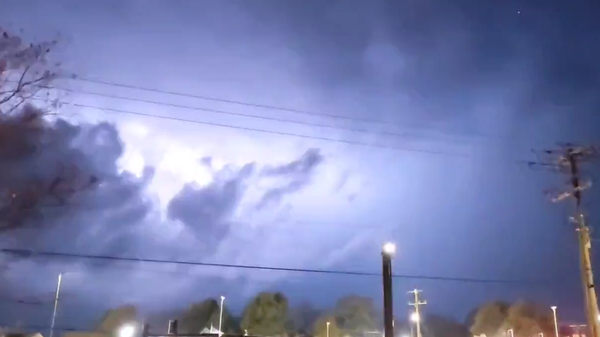 Image captures moment weather watchers encountered nearly continuous lightning spurts in Starkville, Mississippi. Much of the US South is under a severe weather alert warning locals of potentially devastating lightning strikes, tornadoes and powerful winds. - Sputnik International