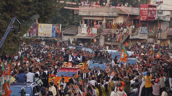 Indian Prime Minister Narendra Modi, waves from a truck as he campaigns for the Gujarat state elections in Ahmedabad, India, Thursday, Dec.1, 2022. - Sputnik International