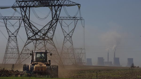 The land is ploughed under electrical pylons leading from a coal-powered electricity generating plant east of Johannesburg, Thursday, Nov. 17 2022. - Sputnik International