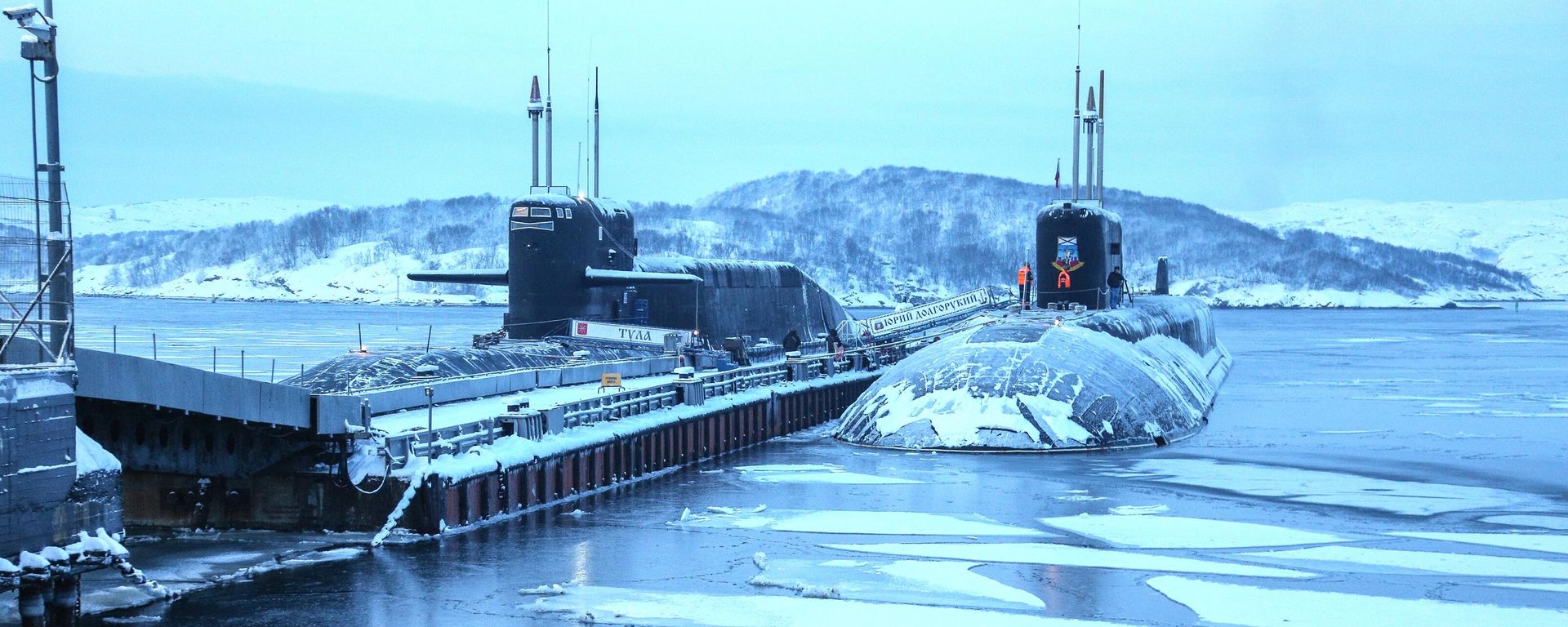 Borei and Delfin-class submarines docked in Murmansk region. File photo. Borei and Delfin-class submarines docked in Murmansk region. File photo. - Sputnik International, 1920, 05.12.2022