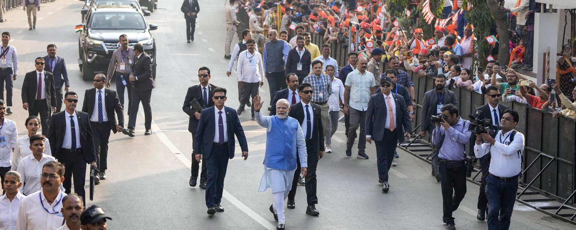Indian Prime Minister Narendra Modi waves to people as he arrives to cast his vote during the second phase of Gujarat state legislature elections in Ahmedabad, India, Monday, Dec. 5, 2022. Indian Prime Minister Narendra Modi waves to people as he arrives to cast his vote during the second phase of Gujarat state legislature elections in Ahmedabad, India, Monday, Dec. 5, 2022. - Sputnik International, 1920, 05.12.2022