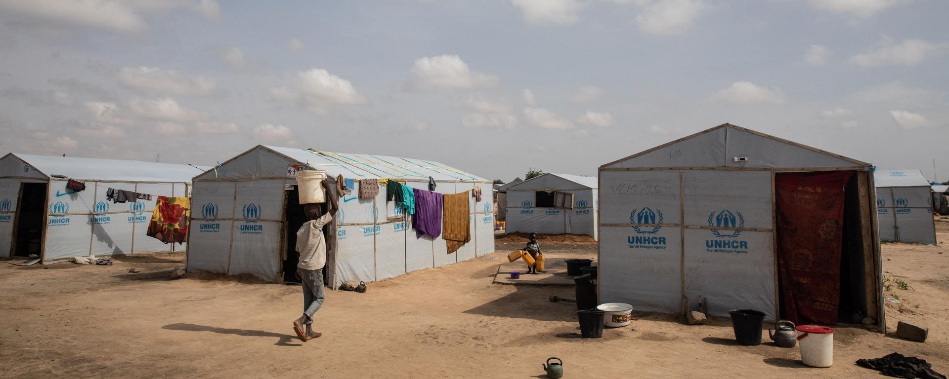 This photo taken on July 26, 2019 shows a general view of the unfinished Mohammed Goni Stadium where internally displaced persons from other congested IDP camps have been moved due to increased influx of people fleeing from Boko Haram attacks in rural areas around Borno State. This photo taken on July 26, 2019 shows a general view of the unfinished Mohammed Goni Stadium where internally displaced persons from other congested IDP camps have been moved due to increased influx of people fleeing from Boko Haram attacks in rural areas around Borno State. - Sputnik International, 1920, 05.12.2022