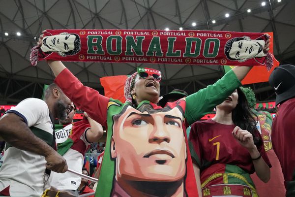 A fan cheers before the World Cup Group H soccer match between Portugal and Uruguay, at the Lusail Stadium in Lusail, Qatar on Monday, November 28, 2022. - Sputnik International
