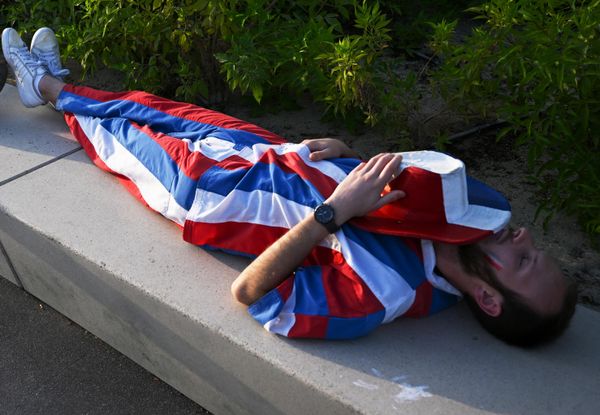 A fan of the French team resting before the 1/8 finals match of the FIFA World Cup between France and Poland. - Sputnik International