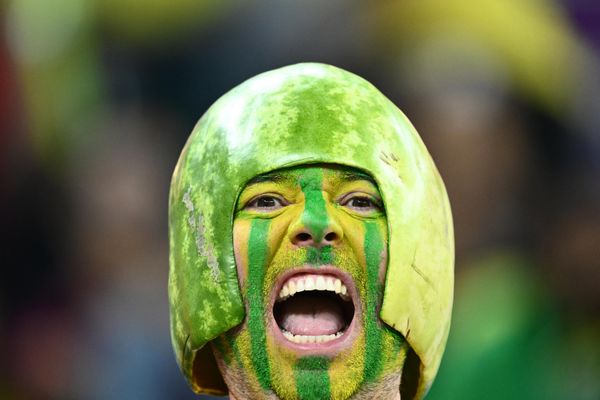 A Brazil fan cheers while waiting for the start of the Qatar 2022 World Cup Group G football match between Brazil and Switzerland at Stadium 974 in Doha on November 28, 2022. (Photo by Jewel SAMAD / AFP) - Sputnik International