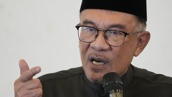 Malaysia's newly appointed prime minister Anwar Ibrahim delivers his speech during a gathering in Kuala Lumpur, Malaysia on November 24, 2022. - Sputnik International
