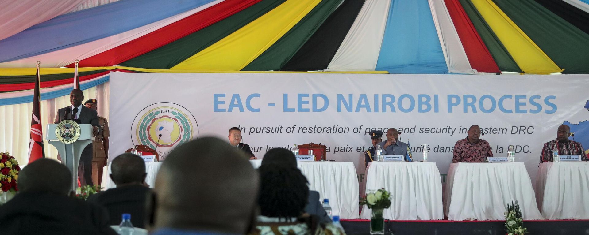 Kenya's President William Ruto, left at podium, speaks at the opening of the Third Inter-Congolese Consultations of the Nairobi Peace Process, the political track, Nairobi III, at a hotel in Nairobi, Kenya Monday, Nov. 28, 2022. Kenya's President William Ruto, left at podium, speaks at the opening of the Third Inter-Congolese Consultations of the Nairobi Peace Process, the political track, Nairobi III, at a hotel in Nairobi, Kenya Monday, Nov. 28, 2022. - Sputnik International, 1920, 07.12.2022