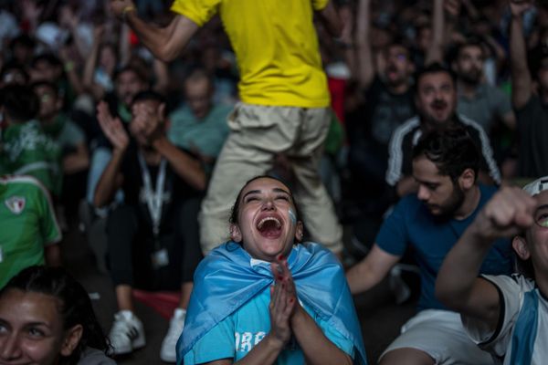 A fan of Argentina reacts after Argentina's Lionel Messi scores his side's opening goal against Mexico as she watch on a giant screen during a World Cup group C soccer match between Argentina and Mexico at the FIFA Fan Festival in Doha, Qatar, Saturday, November 26, 2022. - Sputnik International