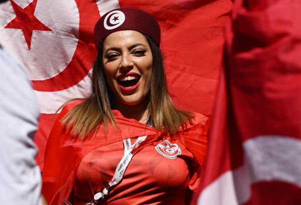 A supporter of the Tunisian national team before the World Cup group stage match between Tunisia and Australia. - Sputnik International