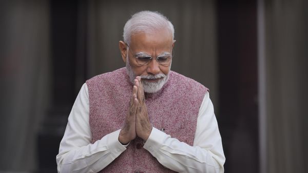 Indian Prime Minister Narendra Modi greets his cabinet colleagues as he arrives on the opening day of the winter session of the Parliament, in New Delhi, India, Wednesday, Dec. 7, 2022. - Sputnik International