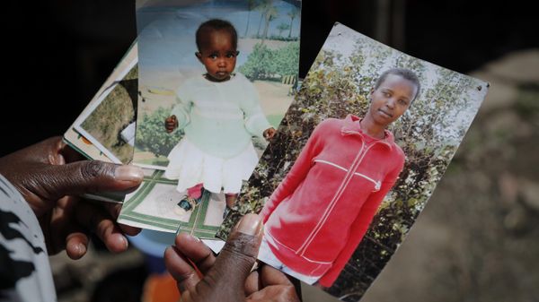 Rose Wanyua Wanjiku, elder sister to Agnes Wanjiru, 20, who was allegedly killed by a British soldier in 2012, holds photographs of Agnes, at Rose's house in the Majengo informal settlement in Nanyuki, Kenya Thursday, Nov. 4, 2021.  - Sputnik International