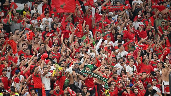 Morocco fans celebrate their team winning the Qatar 2022 World Cup quarter-final football match between Morocco and Portugal at the Al-Thumama Stadium in Doha on December 10, 2022.  - Sputnik International