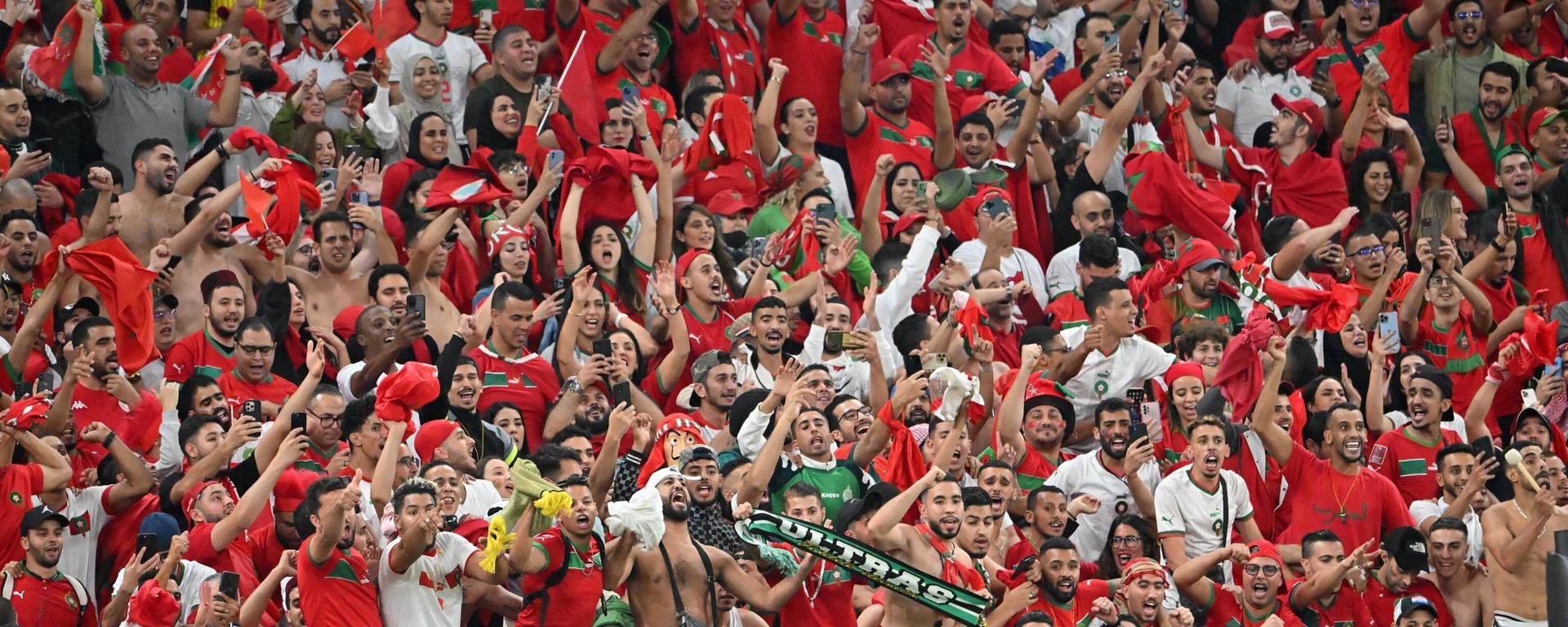 Morocco fans celebrate their team winning the Qatar 2022 World Cup quarter-final football match between Morocco and Portugal at the Al-Thumama Stadium in Doha on December 10, 2022. Morocco fans celebrate their team winning the Qatar 2022 World Cup quarter-final football match between Morocco and Portugal at the Al-Thumama Stadium in Doha on December 10, 2022. - Sputnik International, 1920, 10.12.2022