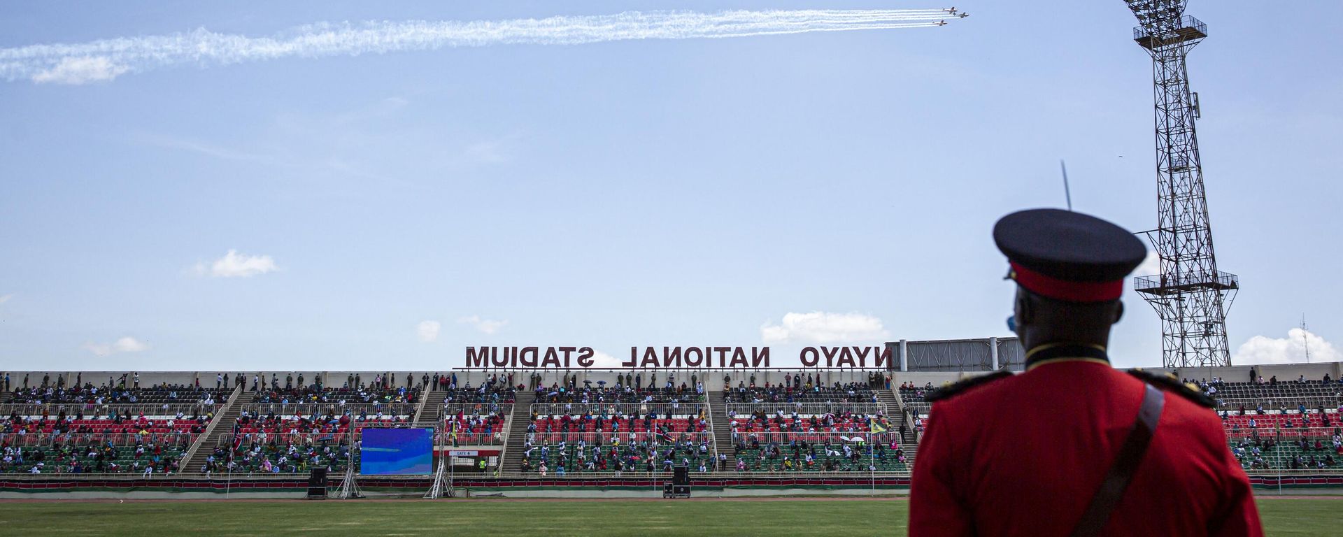 A Kenyan soldier watches as Kenyan Air Force planes do a fly over Nyayo National Stadium during the Independence Day ceremony, called Jamhuri Day (“Republic” in Swahili) in Nairobi, Kenya, on December 12, 2020. A Kenyan soldier watches as Kenyan Air Force planes do a fly over Nyayo National Stadium during the Independence Day ceremony, called Jamhuri Day (“Republic” in Swahili) in Nairobi, Kenya, on December 12, 2020. - Sputnik International, 1920, 12.12.2022