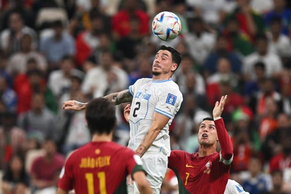 From left: Portugal's Joao Felix, Uruguay's Jose Jimenez, and Portugal's Cristiano Ronaldo in the World Cup group stage match between Portugal and Uruguay. - Sputnik International