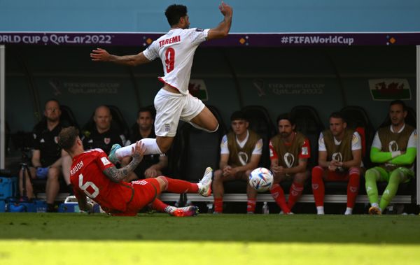 Wales player Joe Rodon(left) and Iranian player Mehdi Taremi at the group stage World Cup match between Wales and Iran. - Sputnik International