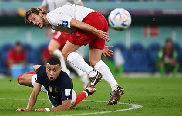 France's Kylian Mbappe (left) and Denmark's Joakim Andersen (right) play in the World Cup group stage match between France and Denmark. - Sputnik International