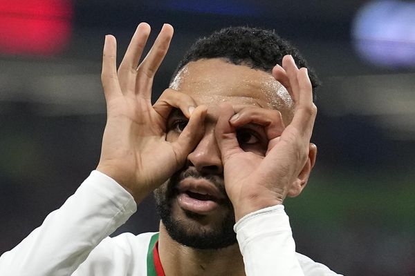 Morocco's Youssef En-Nesyri celebrates after he scored his side's second goal during the World Cup group F soccer match between Canada and Morocco at the Al Thumama Stadium in Doha, Qatar, Thursday, December 1, 2022. (AP Photo/Natacha Pisarenko) - Sputnik International