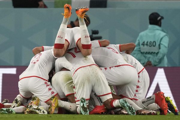 Players from Tunisia celebrate after Wahbi Khazri scored their side's opening goal against France during a World Cup group D soccer match at the Education City Stadium in Al Rayyan, Qatar, Wednesday, November 30, 2022. (AP Photo/Frank Augstein) - Sputnik International