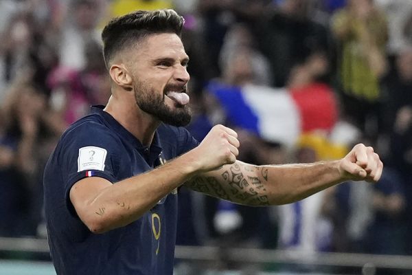 France's Olivier Giroud celebrates after Kylian Mbappe scored their side's second goal during the World Cup round of 16 soccer match between France and Poland at the Al Thumama Stadium in Doha, Qatar, Sunday, December 4, 2022. (AP Photo/Ricardo Mazalan) - Sputnik International