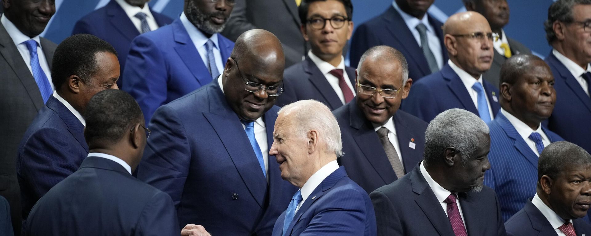 President Joe Biden talks with African leaders before they pose for a family photo during the U.S.-Africa Leaders Summit President Joe Biden talks with African leaders before they pose for a family photo during the U.S.-Africa Leaders Summit - Sputnik International, 1920, 16.12.2022