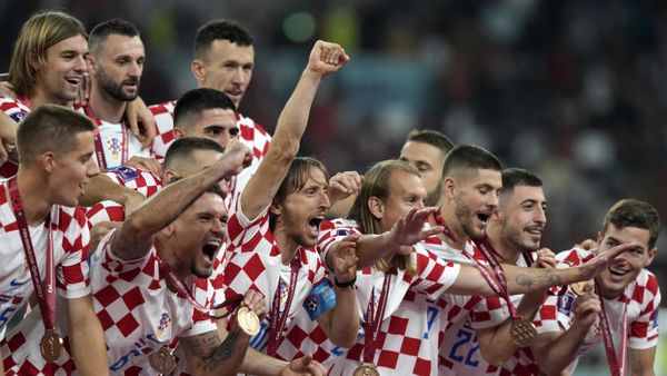 Croatia players celebrate at the end of the World Cup third-place playoff soccer match between Croatia and Morocco at Khalifa International Stadium in Doha, Qatar, Saturday, Dec. 17, 2022.  - Sputnik International