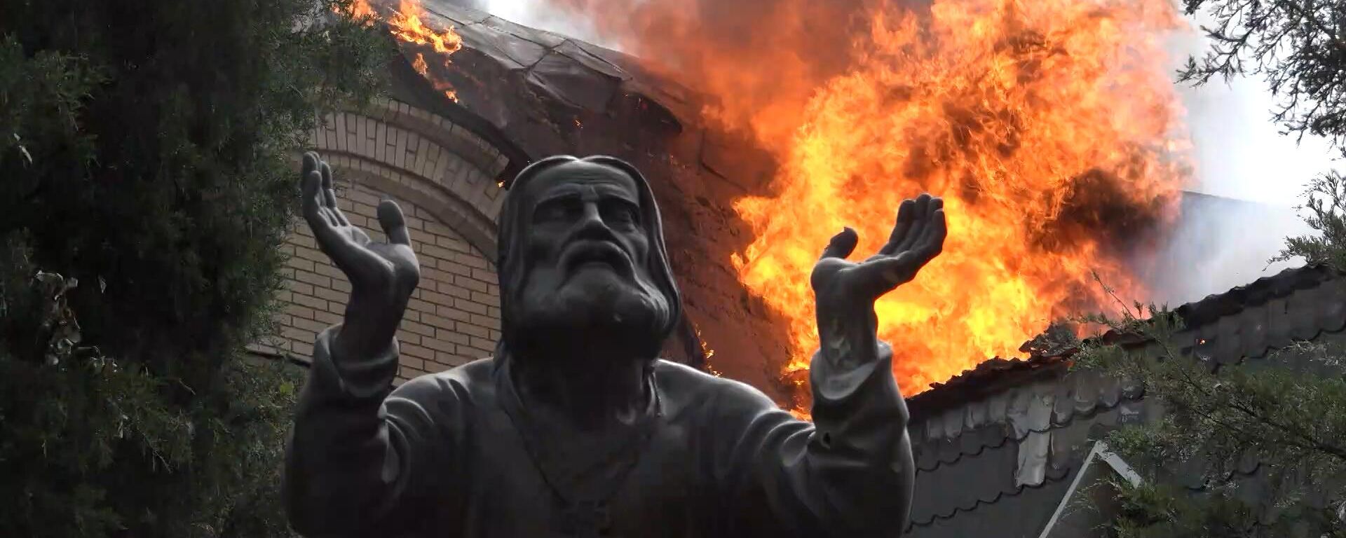 Screen from correspondent Valentin Trushnin's report 'Monastery: Through Heaven and Hell' about the evacuation of civilians from a Donetsk monastery under Ukrainian fire. Screen from correspondent Valentin Trushnin's report 'Monastery: Through Heaven and Hell' about the evacuation of civilians from a Donetsk monastery under Ukrainian fire. - Sputnik International, 1920, 19.12.2022