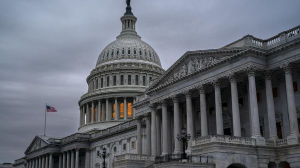 The Senate side of the Capitol is seen in Washington, early Thursday, Dec. 22, 2022, as lawmakers rush to complete passage of a bill to fund the government before a midnight Friday deadline, at the Capitol in Washington, Thursday, Dec. 22, 2022. - Sputnik International