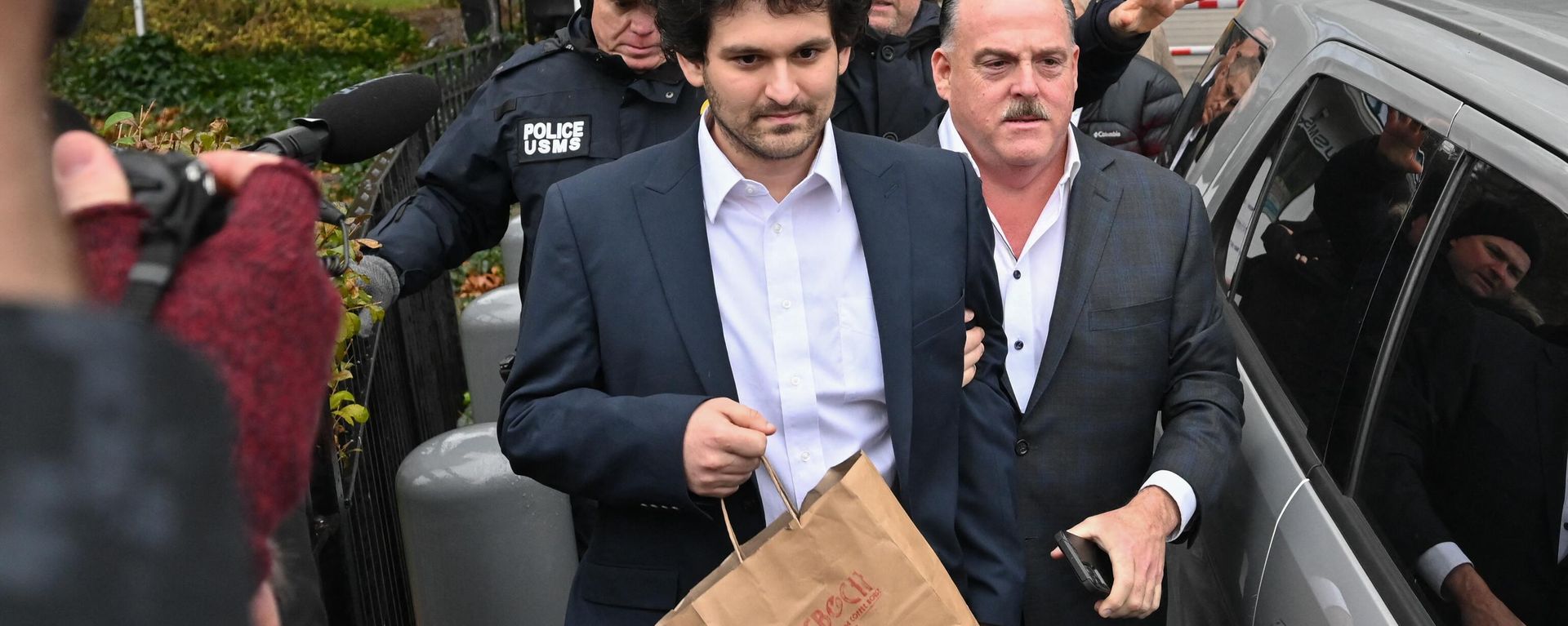 FTX founder Sam Bankman-Fried leaves following his arraignment in New York City on December 22, 2022 FTX founder Sam Bankman-Fried leaves following his arraignment in New York City on December 22, 2022 - Sputnik International, 1920, 24.12.2022