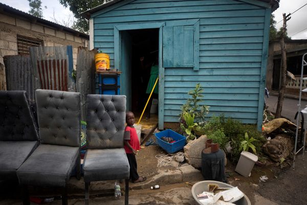 A boy stands outside his house in the aftermath of Hurricane Fiona in El Seibo, Dominican Republic, September 20, 2022. Hurricane Fiona dumped torrential rain on the Dominican Republic and left one person dead after triggering major flooding in Puerto Rico and widespread power blackouts across both Caribbean islands. - Sputnik International
